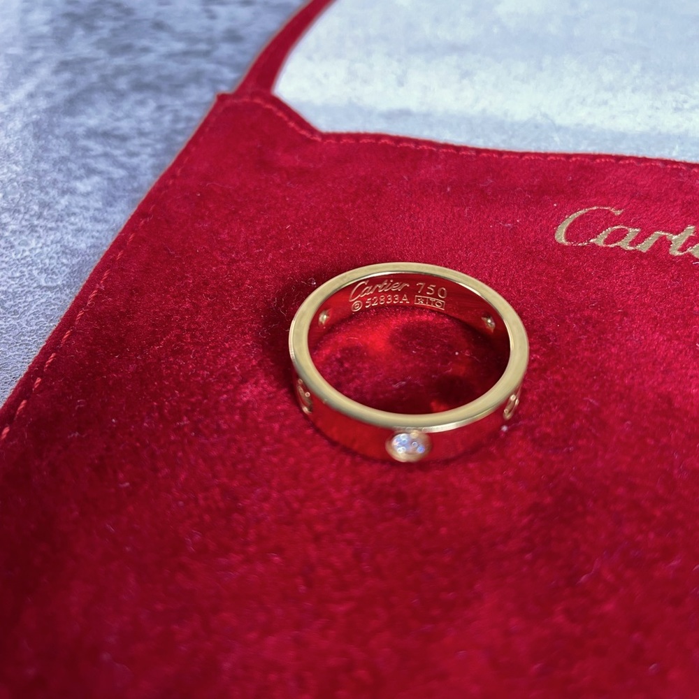 Cartier LOVE ring, 3 Diamonds (1 missing) 18K yellow gold. Size 60 (US 9)